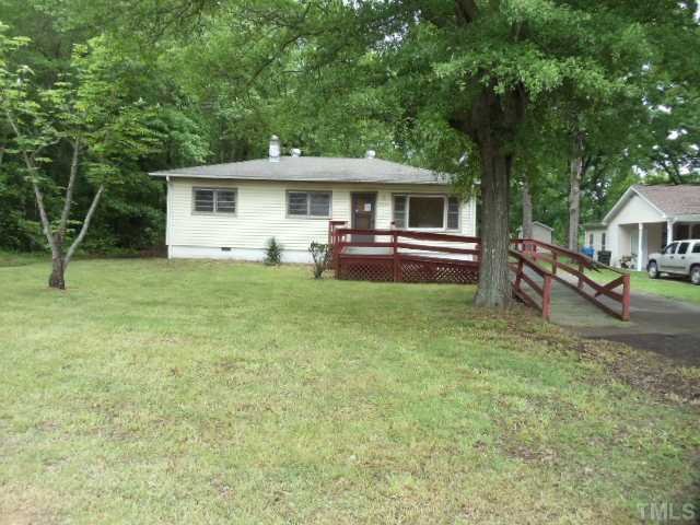5302 Barbee Road Durham, NC 27713 - Photo 1 of 9 a front view of a house with garden