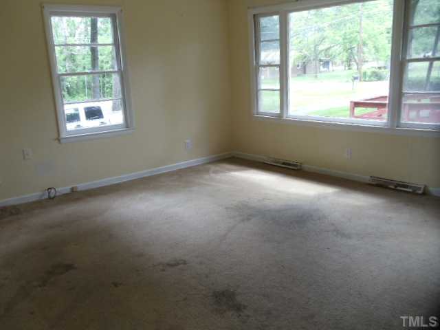 5302 Barbee Road Durham, NC 27713 - Photo 3 of 9 an empty room with a window