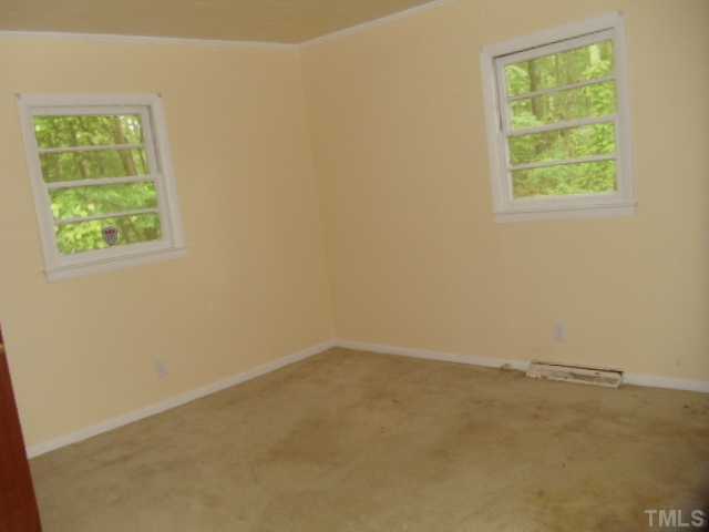 5302 Barbee Road Durham, NC 27713 - Photo 9 of 9 an empty room with a window