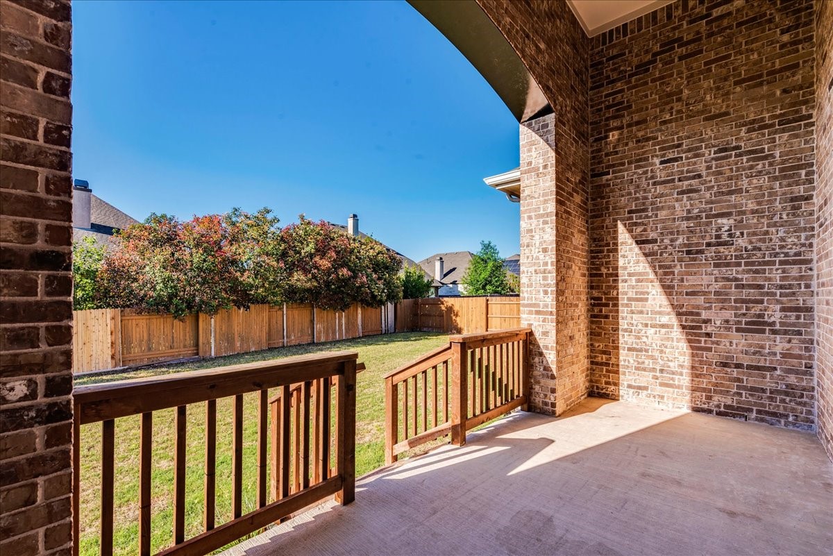 1689 Cool Spring Way Austin, TX 78737 - Photo 33 of 40 Back patio overlooking the large yard.