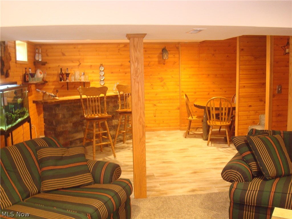 1733 Johns Road Clinton, OH 44216 - Photo 13 of 32 Basement finished about 2 years. Both carpet and hardwood flooring