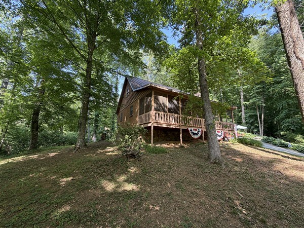238 Trails End Road Blue Ridge, GA 30513 - Photo 28 of 32 a view of a house with a yard and tree