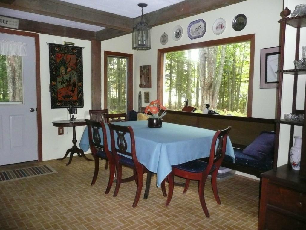 48 Meadow Point Road Lamoine, ME 04605 - Photo 7 of 13 Dining room with views to beautiful...