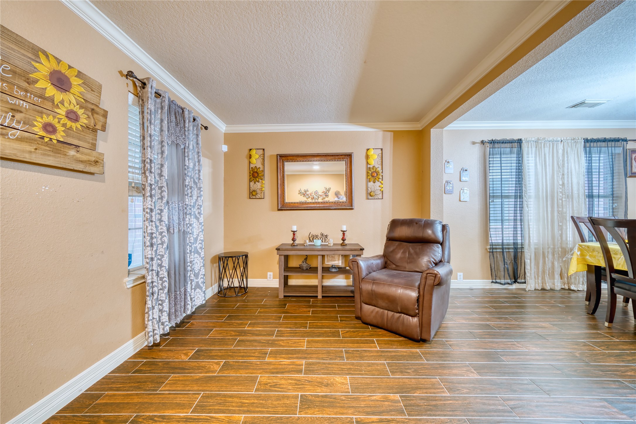 2210 Mountain Ranch Drive Houston, TX 77049 - Photo 11 of 36 a living room with furniture and a flat screen tv