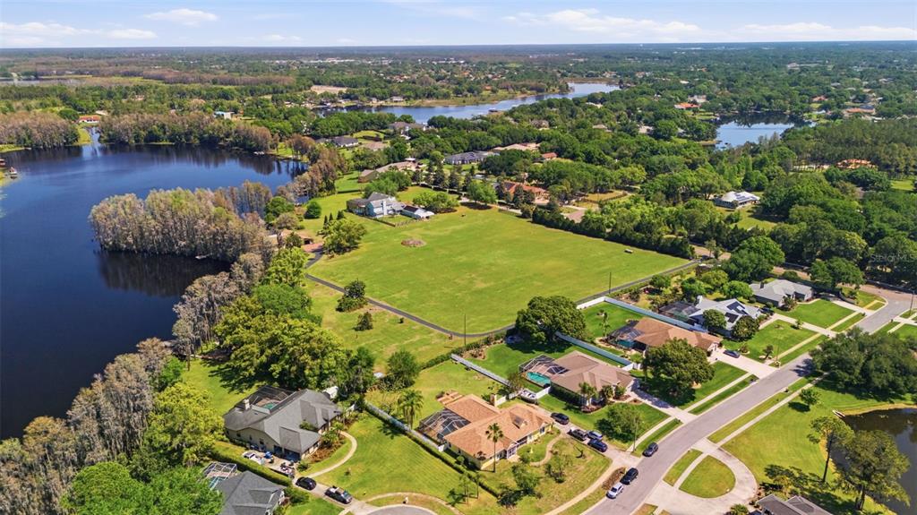 820 Newberger Road Lutz, FL 33549 - Photo 6 of 20 an aerial view of a residential houses with outdoor space and swimming pool