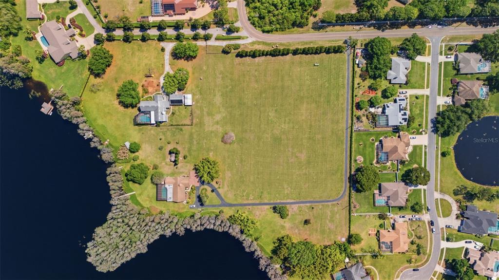 820 Newberger Road Lutz, FL 33549 - Photo 9 of 20 an aerial view of a swimming pool