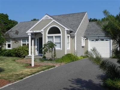 23 Meadowbrook Road Mashpee, MA 02649 - Photo 1 of 20 a front view of a house with garden