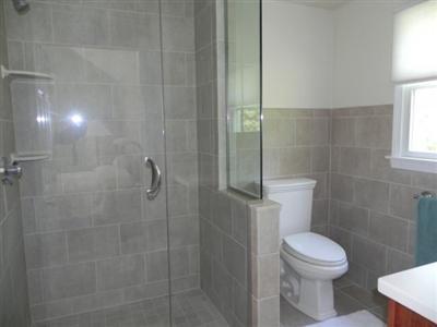 23 Meadowbrook Road Mashpee, MA 02649 - Photo 18 of 20 a bathroom with a toilet and a shower