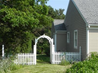 23 Meadowbrook Road Mashpee, MA 02649 - Photo 2 of 20 a front view of a house having yard