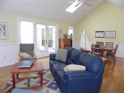 23 Meadowbrook Road Mashpee, MA 02649 - Photo 10 of 20 a living room with furniture and a large window