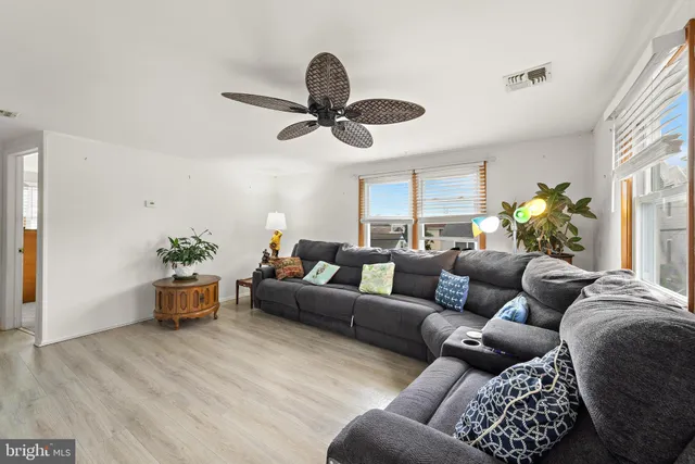 a view of kitchen and dining area with furniture
