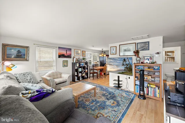 a view of a house with wooden deck