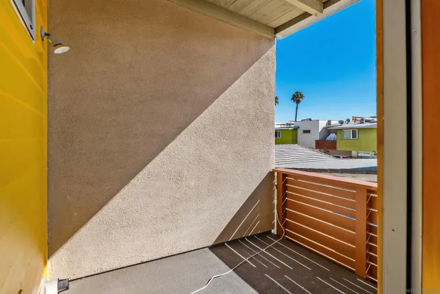 a view of a kitchen with a sink and a window