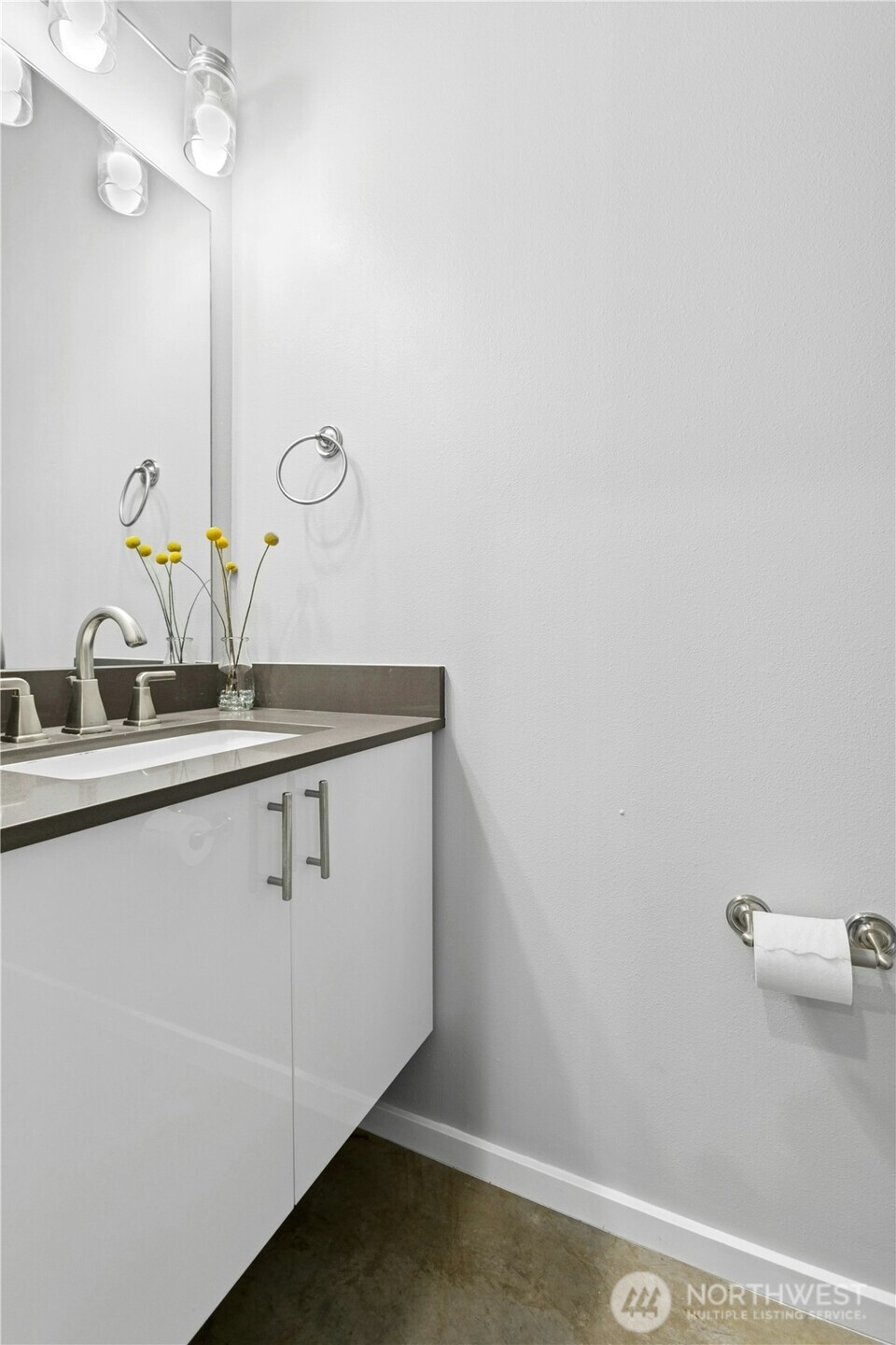 6641 Carleton Avenue South, Unit B Seattle, WA 98108 - Photo 12 of 33 a bathroom with a sink and a mirror