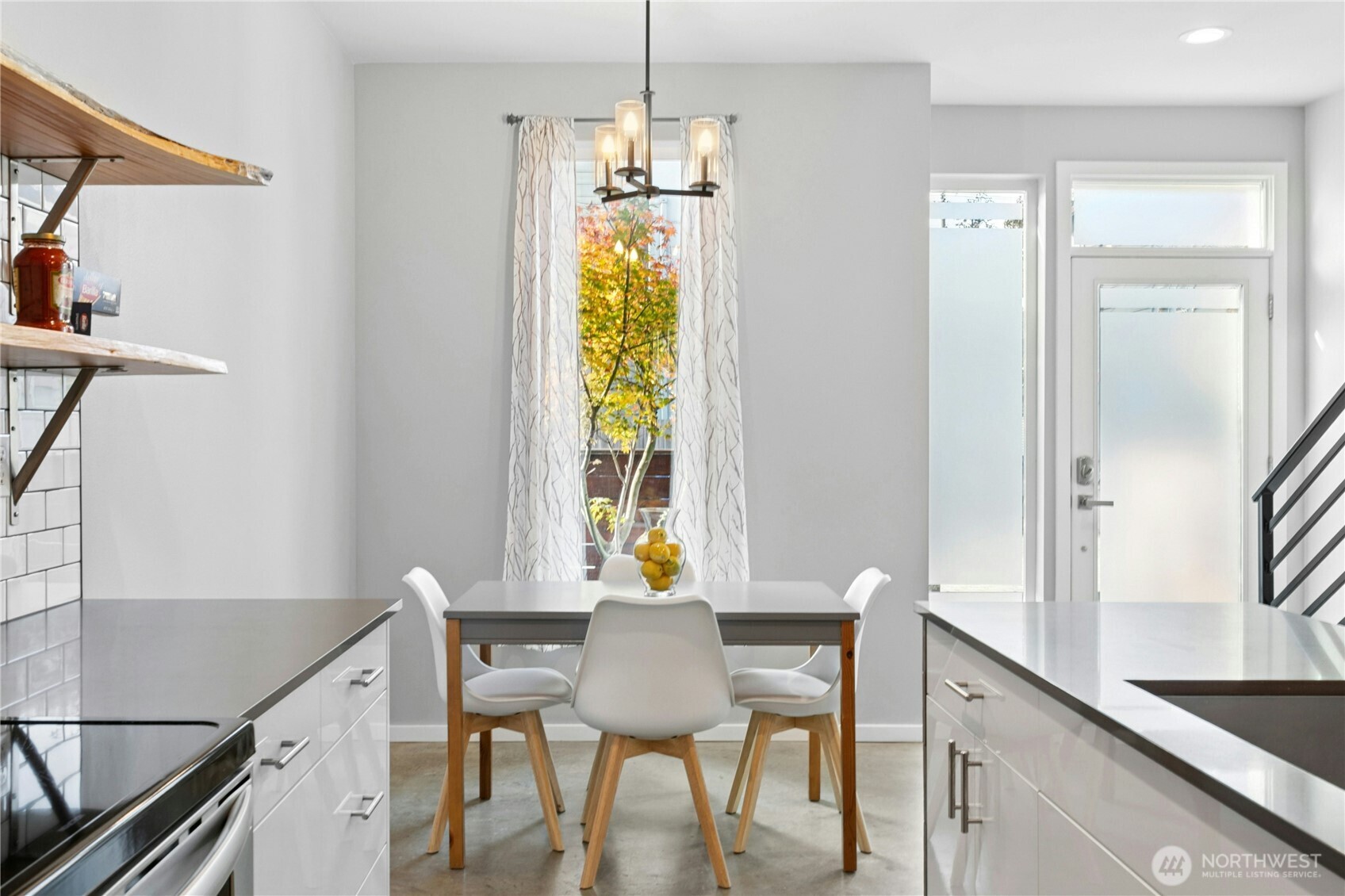 6641 Carleton Avenue South, Unit B Seattle, WA 98108 - Photo 5 of 33 a view of a dining room with furniture and window