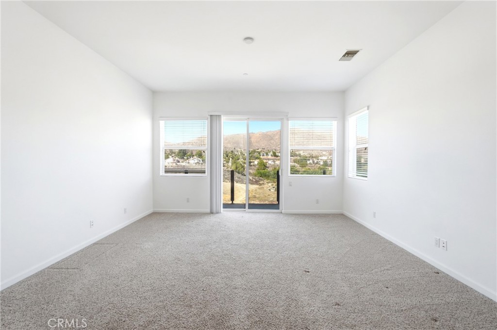 585 Vía Pueblo Riverside, CA 92507 - Photo 47 of 61 Master bedroom with a gorgeous balcony and unbelievable views