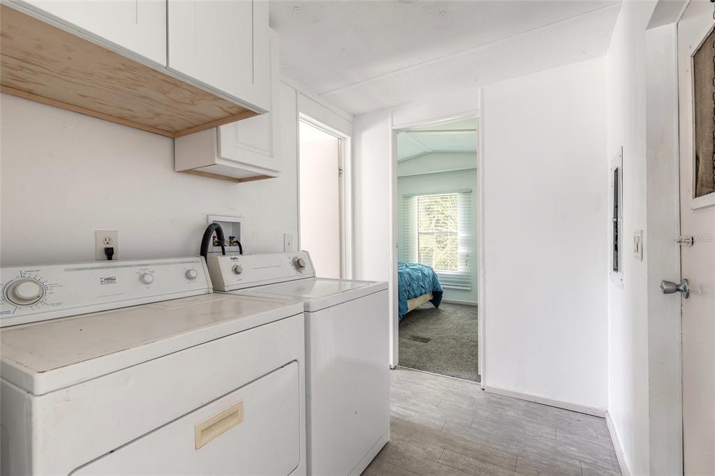 182 Douglas Street Edgewater, FL 32141 - Photo 16 of 30 a room with storage and utility