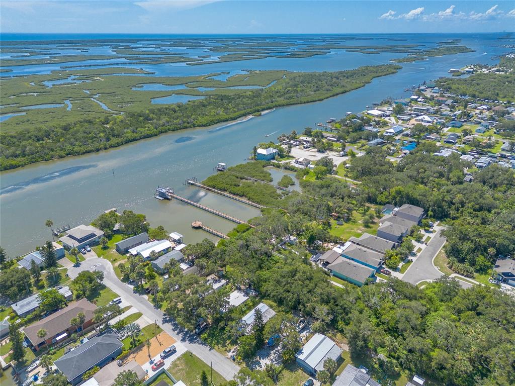 182 Douglas Street Edgewater, FL 32141 - Photo 29 of 30 an aerial view of ocean with residential house with outdoor space
