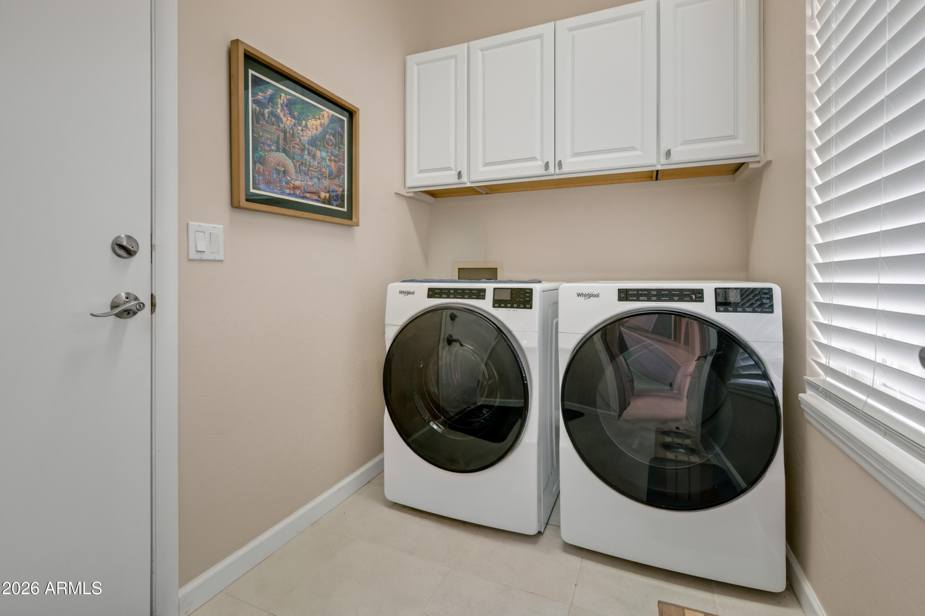 718 South Wandering River Road Cornville, AZ 86325 - Photo 18 of 41 a utility room with dryer and washer