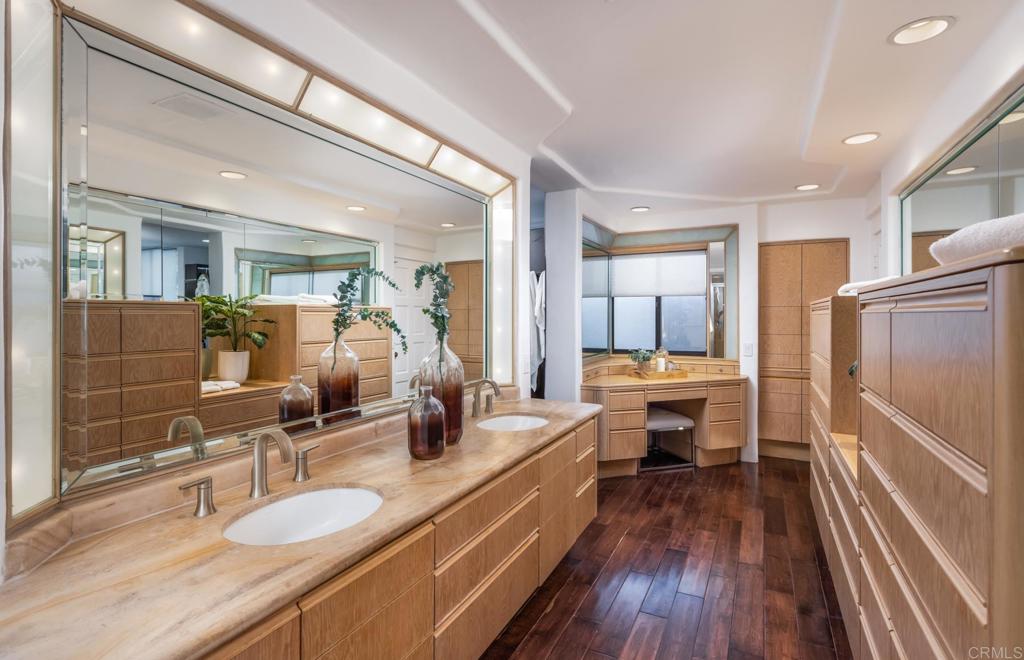 7157 Obelisco Circle Carlsbad, CA 92009 - Photo 36 of 44 a large room with a large window and furniture