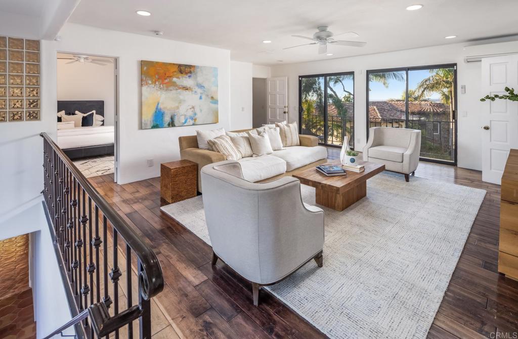 7157 Obelisco Circle Carlsbad, CA 92009 - Photo 38 of 44 a living room with furniture and a large window