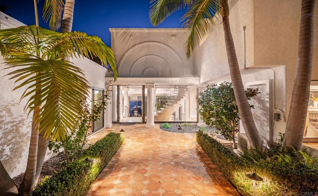 7157 Obelisco Circle Carlsbad, CA 92009 - Photo 43 of 44 a view of a house with a yard