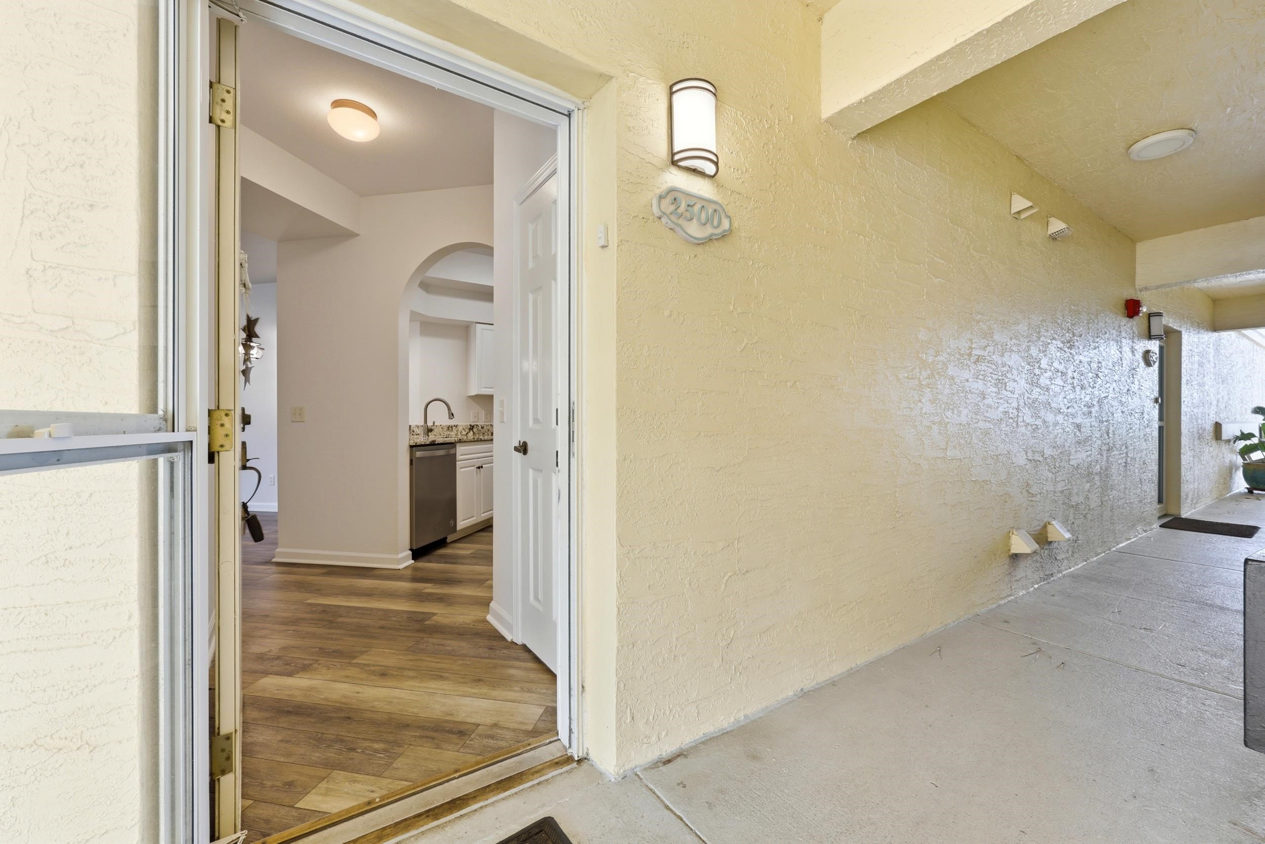 2500 Vista Cove Road St. Augustine, FL 32084 - Photo 5 of 53 wooden floor with a bathroom