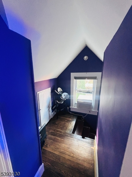 212 4th Street Passaic, NJ 07055 - Photo 10 of 14 a view of a living room and a couch