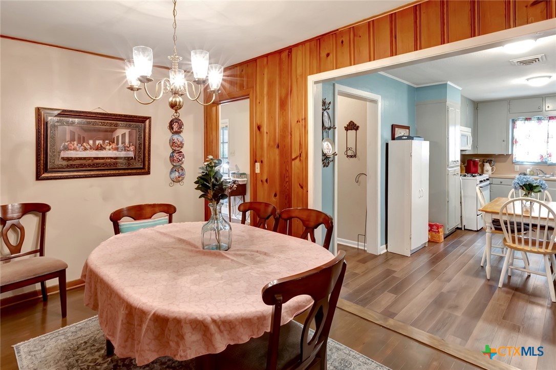 3403 East Rio Grande Street Victoria, TX 77901 - Photo 14 of 41 a dining room with furniture and chandelier