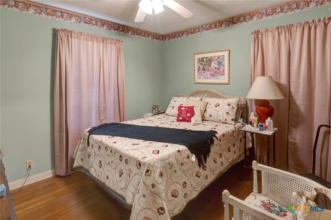 3403 East Rio Grande Street Victoria, TX 77901 - Photo 17 of 41 a bedroom with a bed and a window