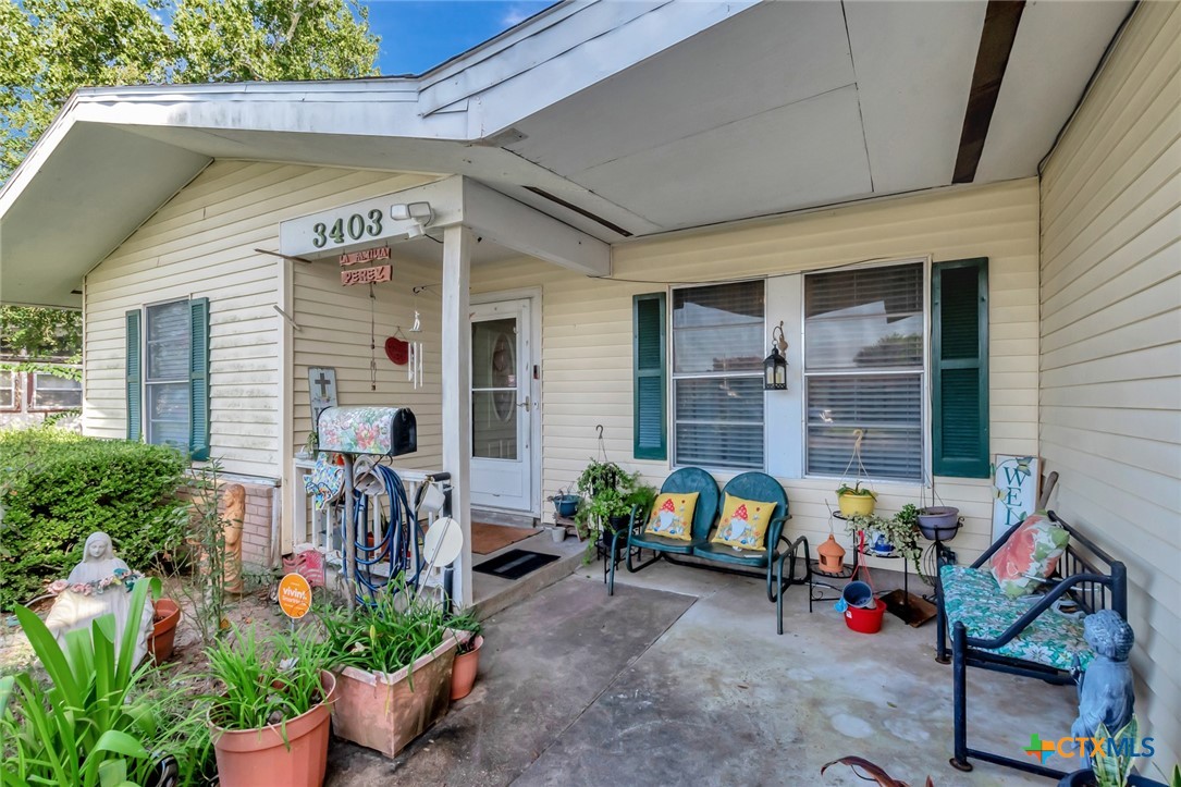 3403 East Rio Grande Street Victoria, TX 77901 - Photo 2 of 41 a front view of a house with outdoor seating