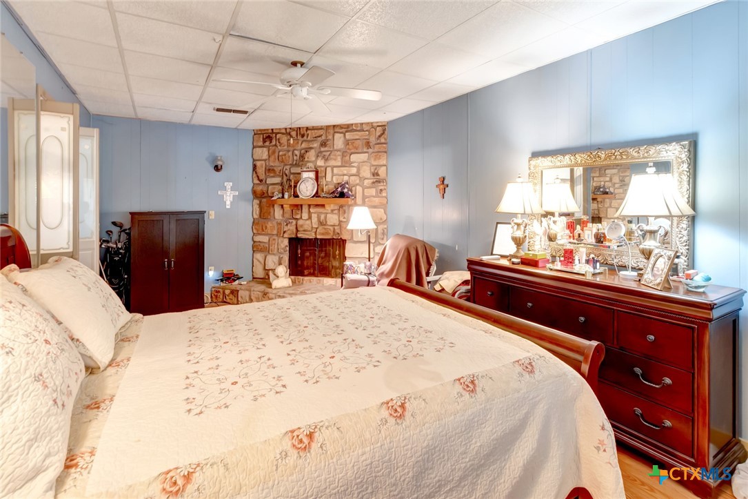 3403 East Rio Grande Street Victoria, TX 77901 - Photo 21 of 41 a bed room with a bed and a dresser
