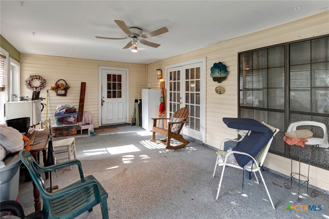 3403 East Rio Grande Street Victoria, TX 77901 - Photo 24 of 41 a living room with furniture a flat screen tv and a window