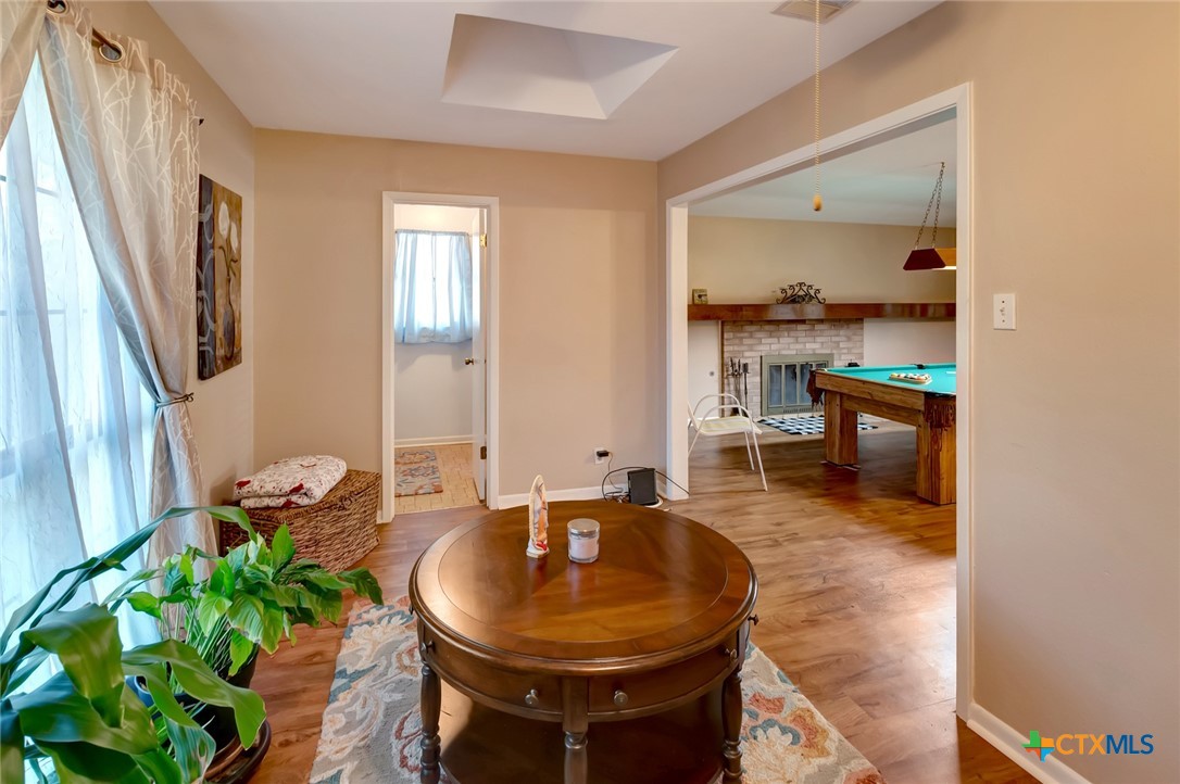 3403 East Rio Grande Street Victoria, TX 77901 - Photo 25 of 41 a living room with dining table and a large window