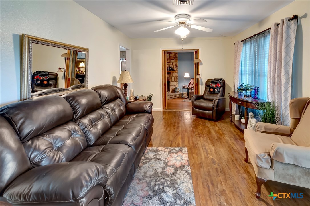 3403 East Rio Grande Street Victoria, TX 77901 - Photo 5 of 41 a living room with furniture and a flat screen tv
