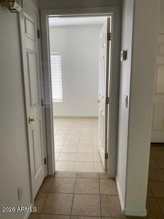 a bathroom with a toilet sink and shower