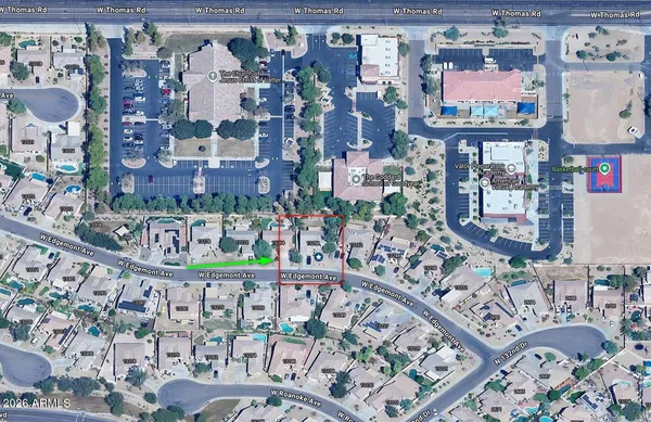 a kitchen with granite countertop a sink stove and cabinets