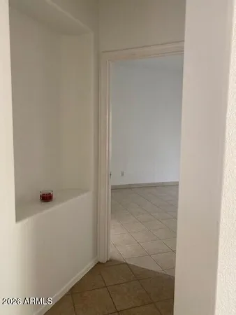 a view of hallway with windows