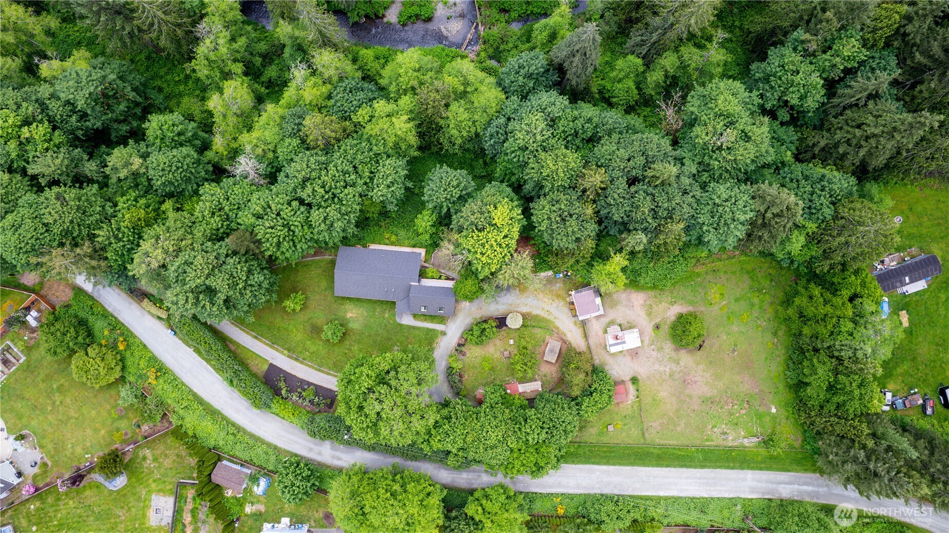 24522 Cromwell Road Monroe, WA 98272 - Photo 2 of 40 an aerial view of residential house with outdoor space and trees all around