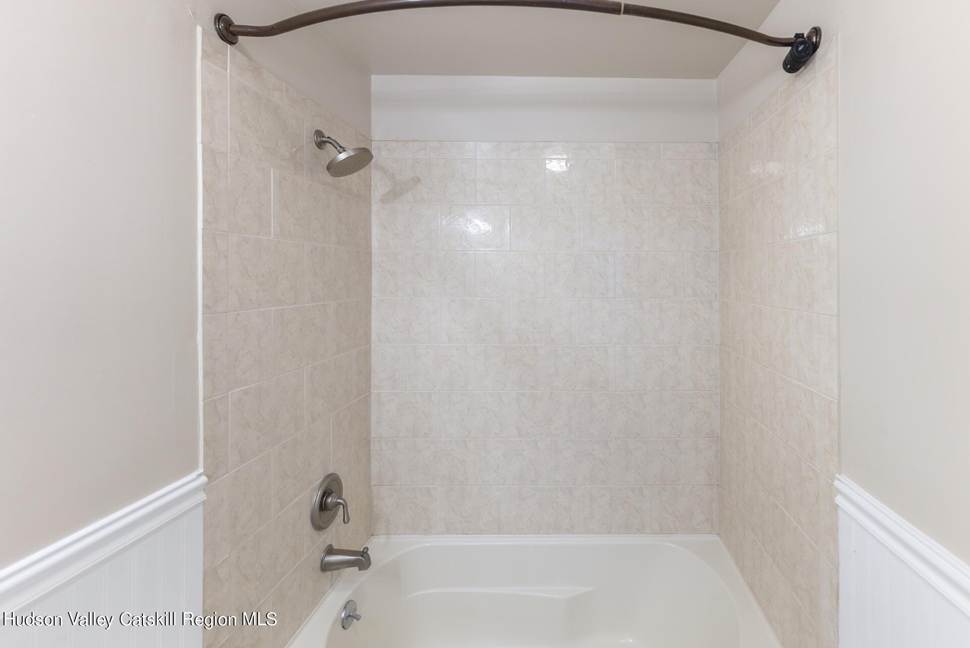 6 Colonial Road, Unit 46 Beacon, NY 12508 - Photo 17 of 19 a bathroom with a bathtub