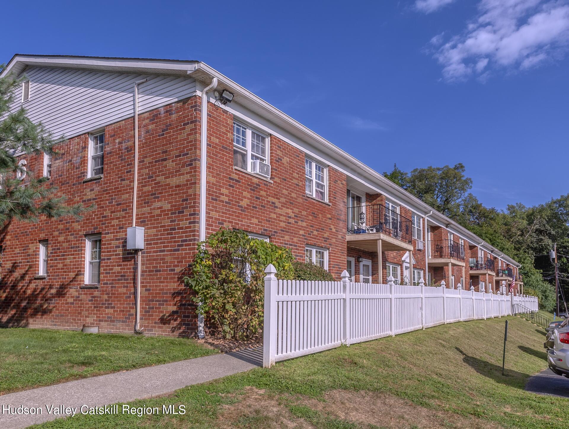 6 Colonial Road, Unit 46 Beacon, NY 12508 - Photo 19 of 19 a front view of a house with a yard