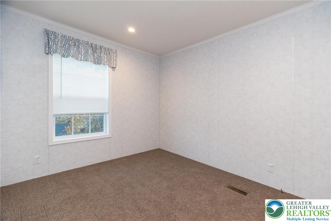 465 Royal Manor Road, Unit LOT 6 Easton, PA 18042 - Photo 13 of 25 an empty room with a window