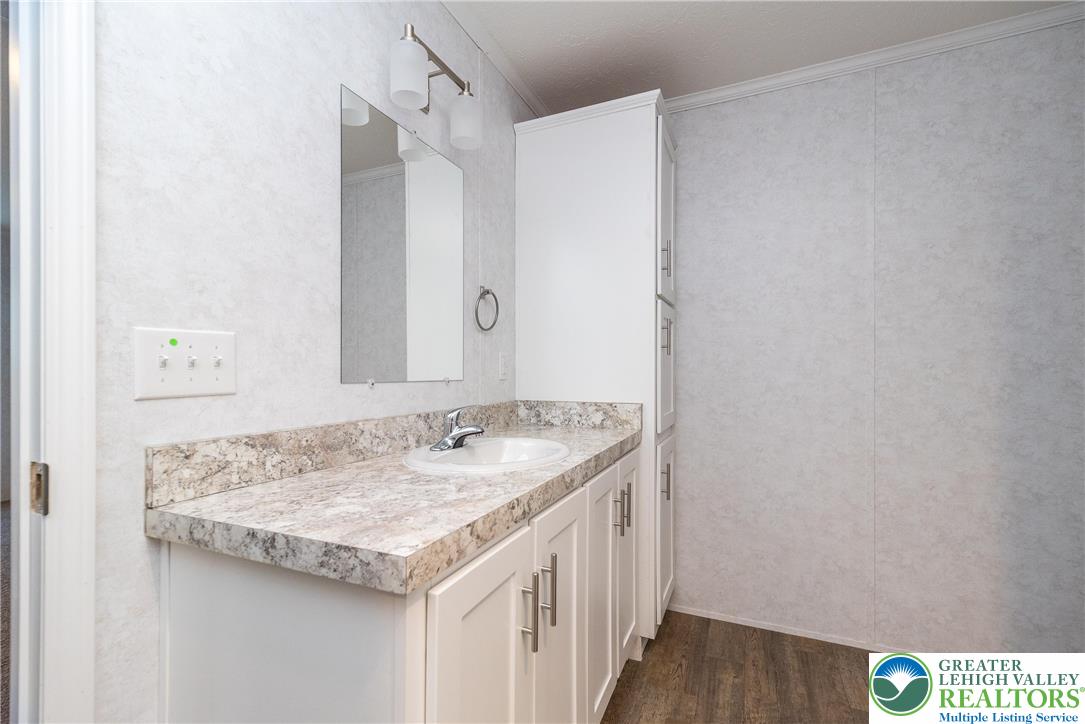 465 Royal Manor Road, Unit LOT 6 Easton, PA 18042 - Photo 21 of 25 a bathroom with a sink and a mirror