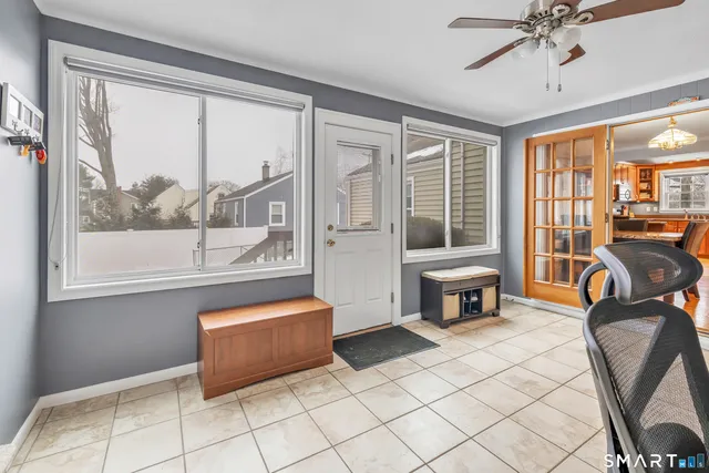 a living room with furniture and a window