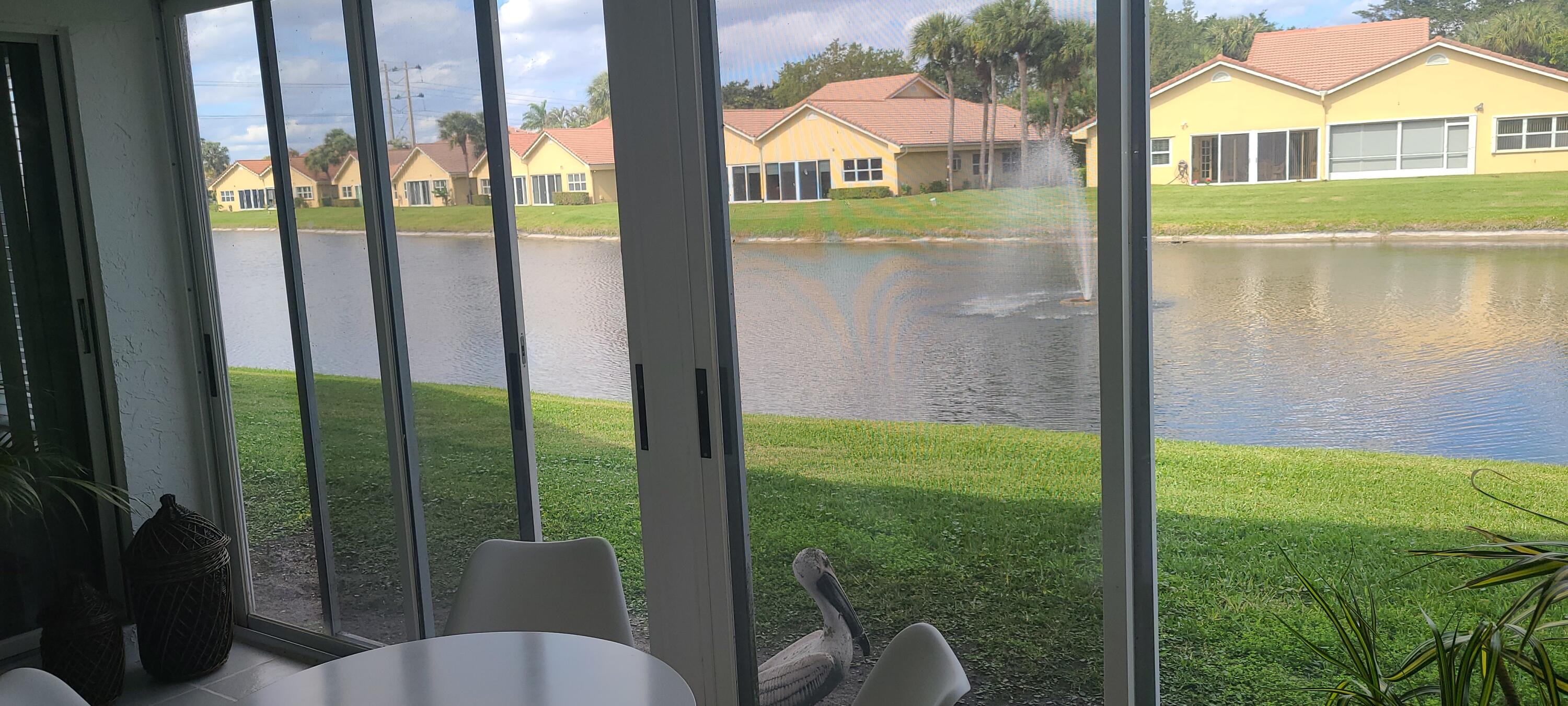 11105 Rios Road Boca Raton, FL 33498 - Photo 10 of 31 a view of a balcony with lake view