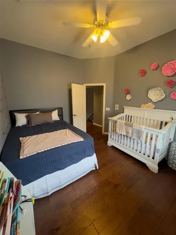 a large white bed in a white room