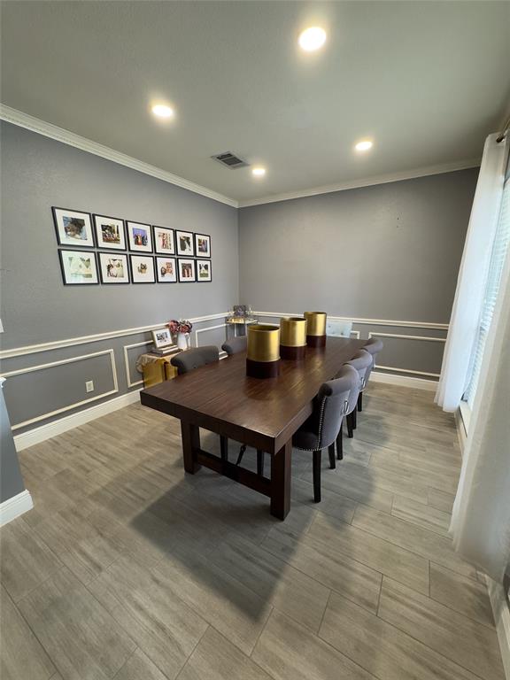 413 Ridge Meade Drive Lewisville, TX 75067 - Photo 2 of 23 a view of a workspace with furniture