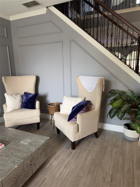413 Ridge Meade Drive Lewisville, TX 75067 - Photo 4 of 23 a living room with furniture and wooden floor