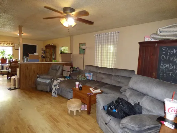a kitchen with a refrigerator and a sink