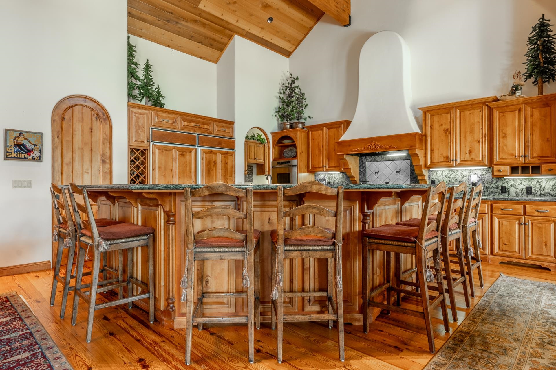 45 Skyline Road June Lake, CA 93529 - Photo 13 of 58 a view of a kitchen with furniture and wooden floor